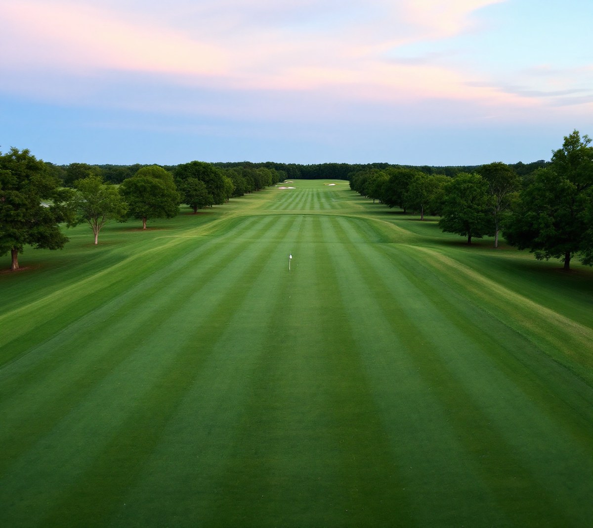 A drive flown four times down a fairway: in still air, in a 10 mph crosswind, into a 10 mph wind and downwind